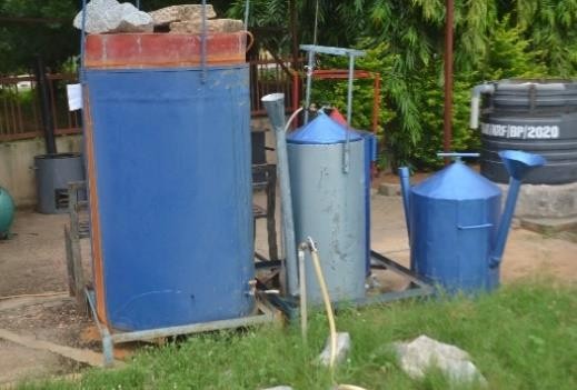 Biogas digesters and gas holders at the Centre's demonstration area.